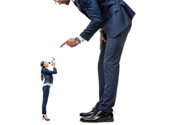 small businesswoman shouting in mouthpiece at big businessman pointing with finger Isolated On White clipart