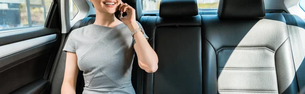 Panoramic Shot Businesswoman Talking Smartphone Car — Stock Photo, Image