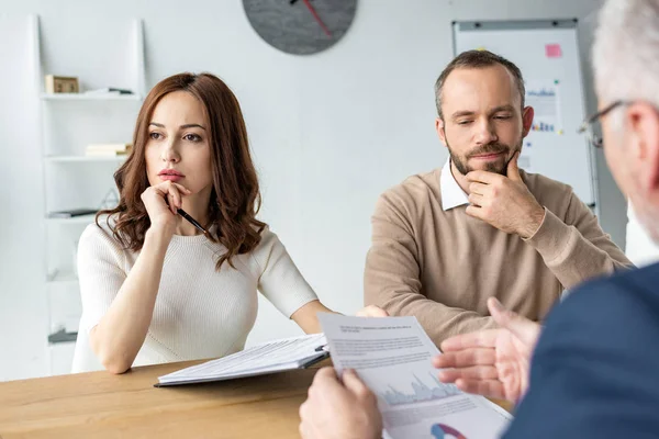 Selective Focus Pensive Man Thoughtful Woman Sitting Car Dealer Office — Stock Photo, Image