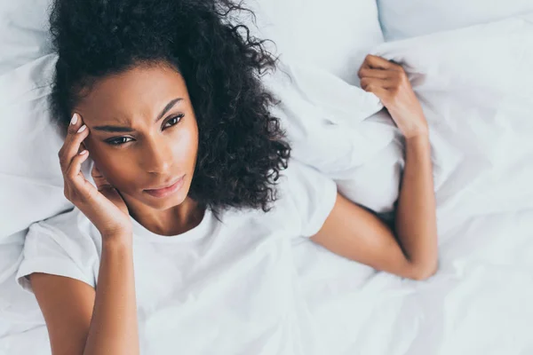 Upset African American Woman Suffering Headache While Lying Bed — Stock Photo, Image