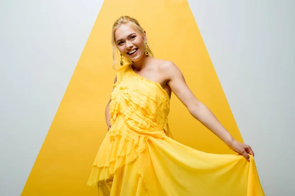 Happy Blonde Girl Smiling While Posing Looking Camera White Yellow — Stock Photo, Image