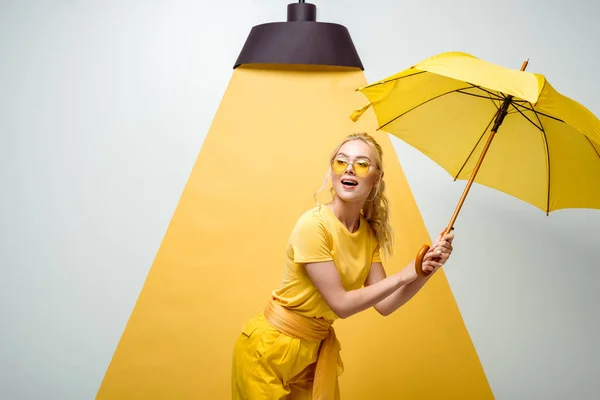 Cheerful Blonde Girl Sunglasses Holding Umbrella White Yellow — Stock Photo, Image