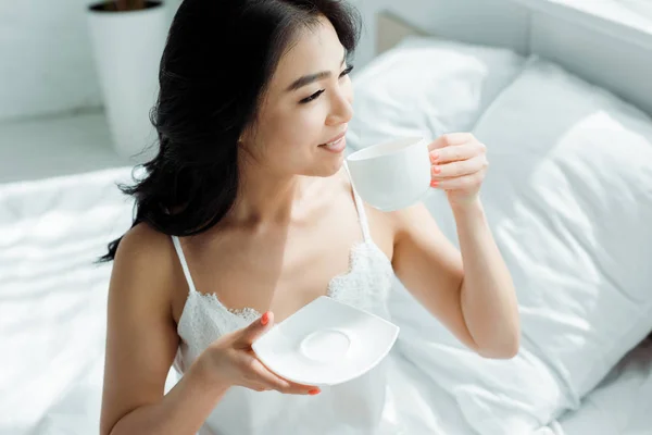 Happy Brunette Thai Woman Holding Cup Drink Bedroom — Stock Photo, Image