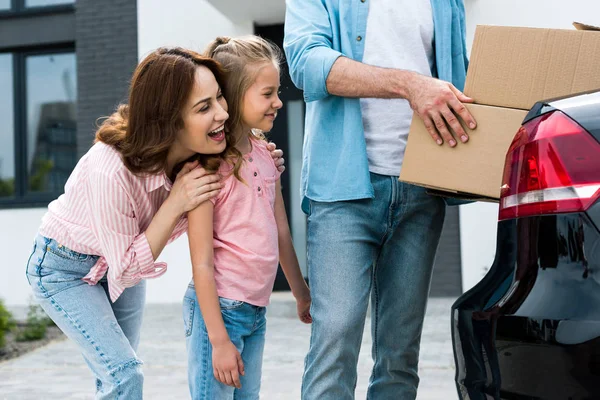 Cropped View Man Holding Boxes Happy Kid Wife — Stock Photo, Image