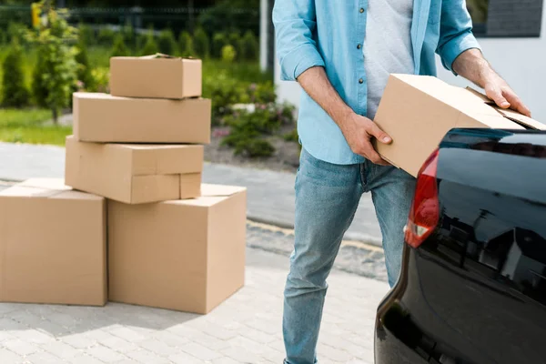 Cropped View Man Standing Car While Putting Box — Stock Photo, Image