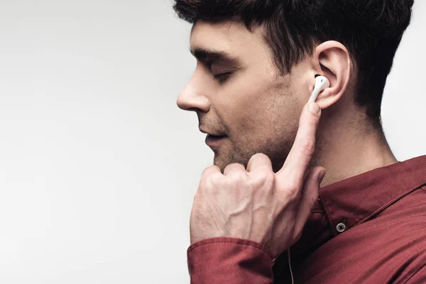 Pensive Man Closed Eyes Listening Music Earphones Isolated Grey — Stock Photo, Image