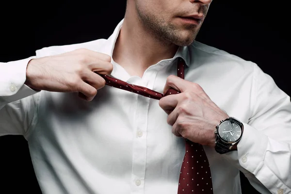 Частковий Вигляд Засмученого Бізнесмена Знімає Краватку Ізольовано Чорному — стокове фото