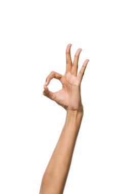 cropped view of young african american woman showing ok sign isolated on white  clipart