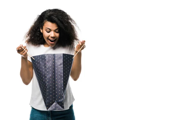 Happy African American Girl Looking Black Shopping Bag Isolated White — Stock Photo, Image