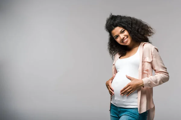 Positive Young Pregnant African American Woman Touching Belly Grey — Stock Photo, Image