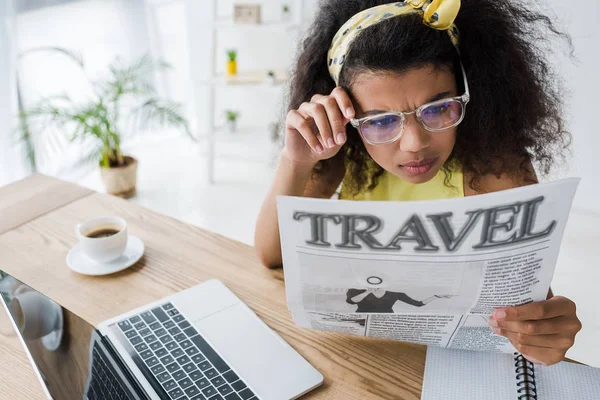 Attractive African American Woman Glasses Reading Travel Newspaper Laptop — Stock Photo, Image