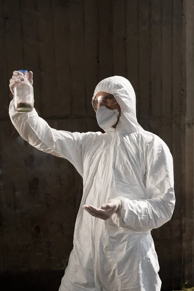 Ecologist Protective Costume Respirator Holding Bottle Soil Sample — Stock Photo, Image