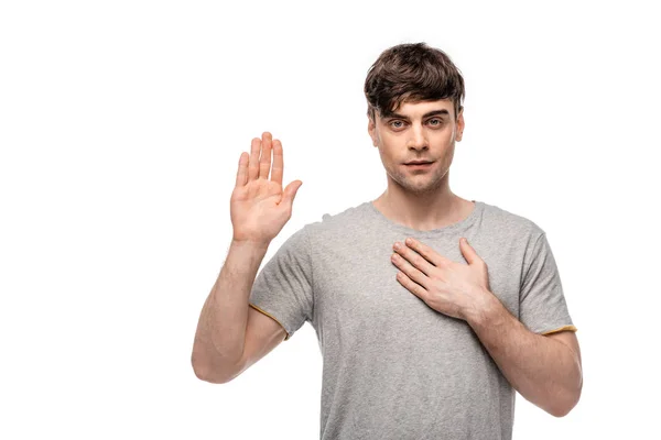 Serious Young Man Looking Camera While Showing Swear Gesture Isolated — Stock Photo, Image