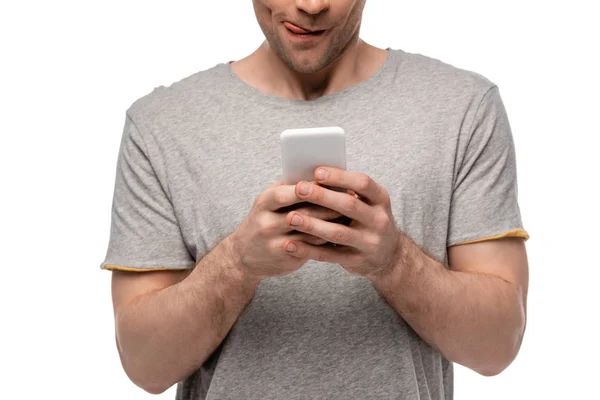 Beyaz Izole Akıllı Telefon Kullanırken Dudakları Yalama Genç Adam Kırpılmış — Stok fotoğraf