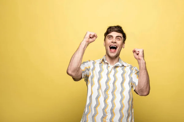 Cheerful Young Man Looking Showing Winner Gesture Yellow Background — Stock Photo, Image