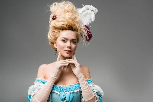 Beautiful Victorian Woman Wig Feathers Looking Camera Touching Face Grey — Stock Photo, Image