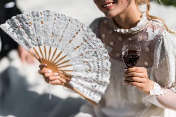 Cropped View Happy Young Victorian Woman Holding Fan Wine Glass — Stock Photo, Image