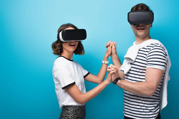 Cheerful Man Woman Holding Hands While Using Virtual Reality Headsets — Stock Photo, Image