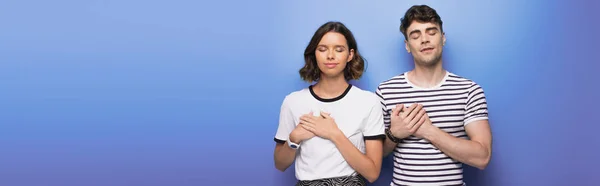 Panoramic Shot Pensive Man Woman Showing Swear Gestures Blue Background — Stock Photo, Image