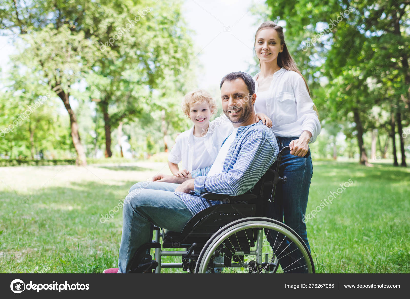 Happy Mother Son Disabled Father Wheelchair Park — Stock Photo
