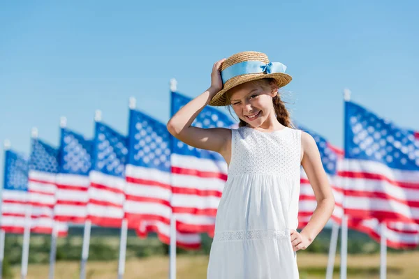 Happy Child Standing White Dress Touching Straw Hat American Flags — Stock Photo, Image