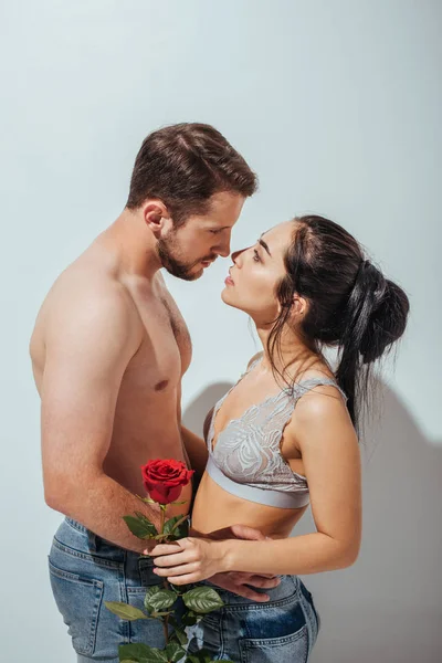 Side View Handsome Man Beautiful Girl Hugging Trying Kiss While — Stock Photo, Image