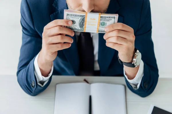 Cropped View Businessman Smelling Dollar Banknotes Notebook Pen — Stock Photo, Image