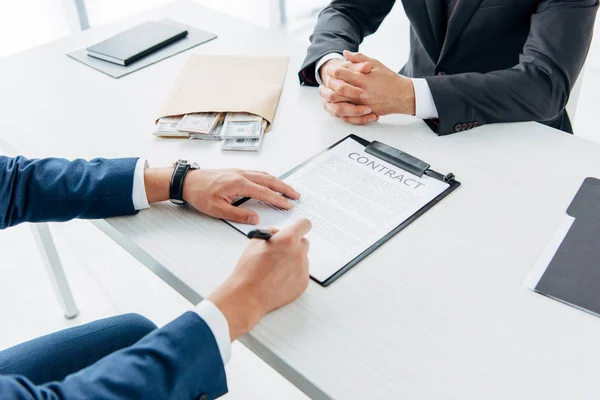 Selective Focus Businessman Signing Document Envelope Bribe Business Partner Clenched — Stock Photo, Image