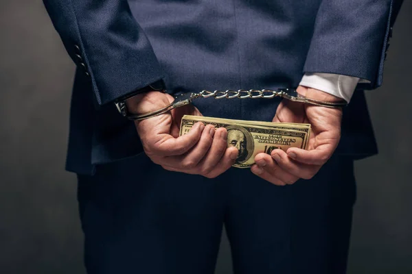 Cropped View Handcuffed Man Suit Holding Bribe Grey — Stock Photo, Image