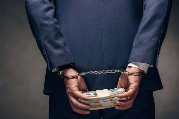 Cropped View Handcuffed Businessman Suit Holding Bribe Grey — Stock Photo, Image