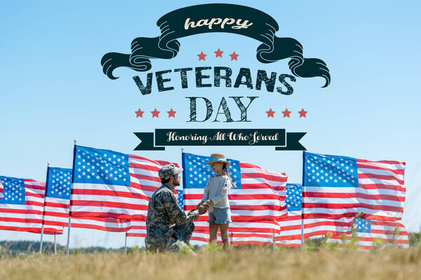 selective focus of military father holding hands with cute kid near american flags with happy veterans day, honoring all who served illustration 