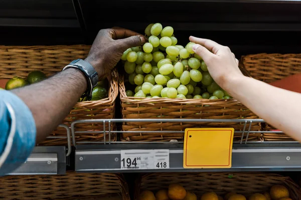 Cropped View African American Man Woman Taking Grapes Store — Stock Photo, Image