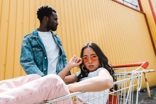 Selective Focus Asian Girl Touching Sunglasses African American Man — Stock Photo, Image