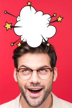 excited handsome man in glasses looking up at empty bang cloud with stars isolated on red clipart