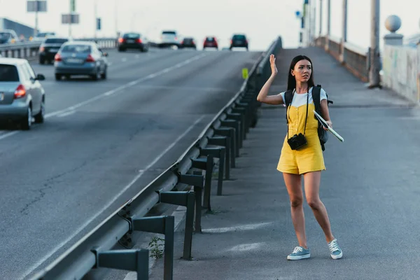 Asian Beautiful Woman Overalls Holding Map Looking Away — Stock Photo, Image