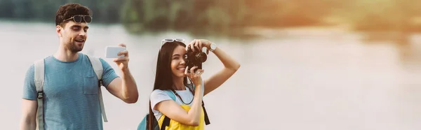 Panoramic Shot Asian Woman Taking Photo Handsome Man Using Smartphone — Stock Photo, Image