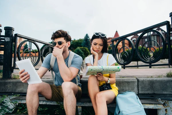 Sad Handsome Man Looking Digital Tablet Asian Woman Looking Map — Stock Photo, Image