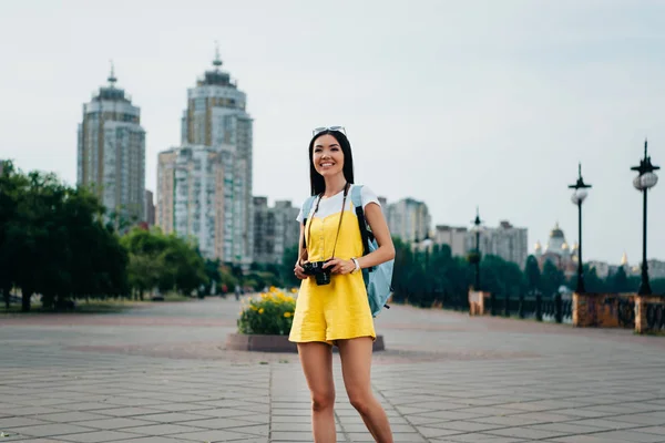 Attractive Asian Woman Overalls Holding Digital Camera — Stock Photo, Image
