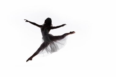 young graceful ballerina jumping while dancing isolated on white clipart