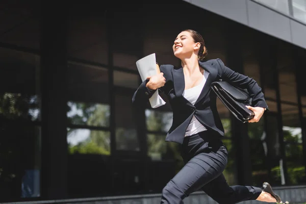 Happy Businesswoman Running Smiling While Holding Briefcase Folder — Stock Photo, Image
