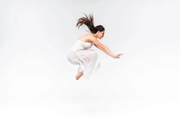 Side View Young Beautiful Ballerina Jumping While Dancing Grey Background — Stock Photo, Image