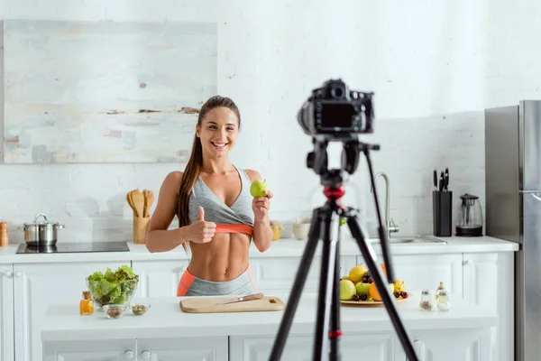 Selective Focus Happy Girl Showing Thumb Holding Apple Digital Camera — Stock Photo, Image