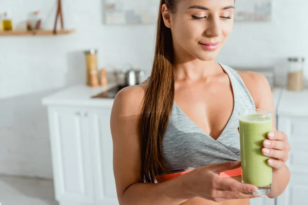 Happy Sportive Girl Looking Glass Green Smoothie — Stock Photo, Image