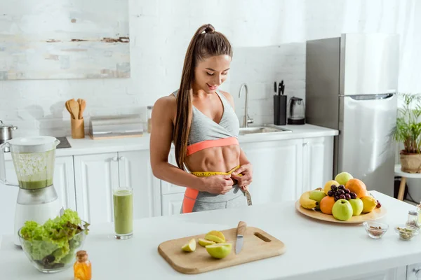 Happy Girl Measuring Waist Fruits Smoothie Glass — Stock Photo, Image