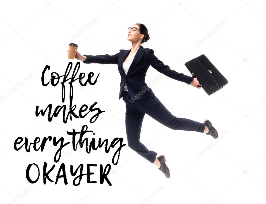attractive businesswoman holding coffee to go and briefcase while levitating near coffee makes everything okayer lettering isolated on white