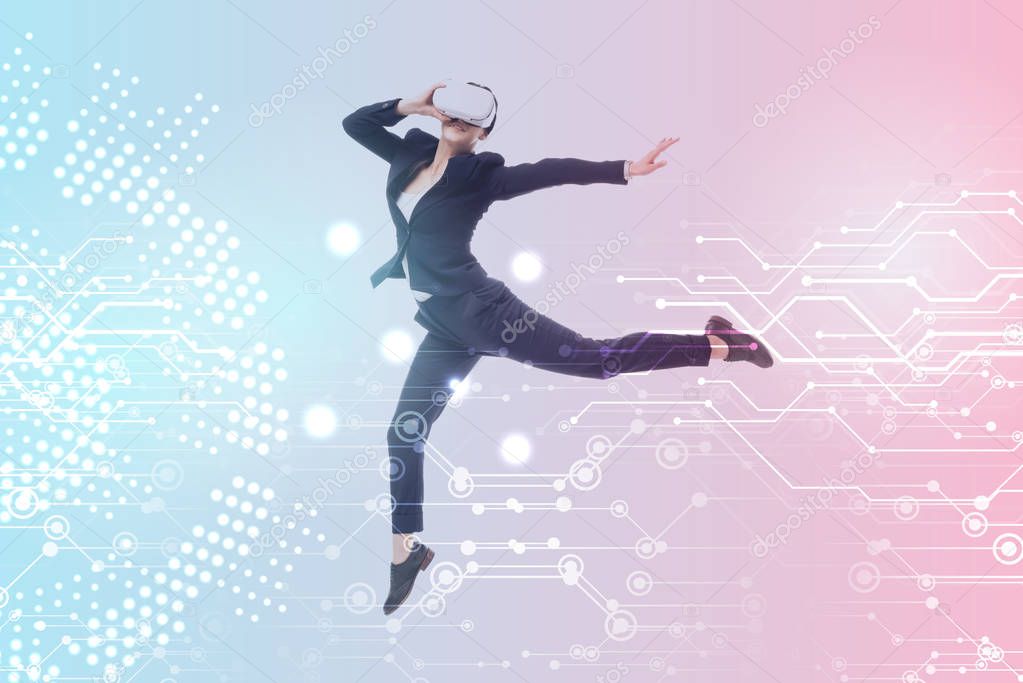 young businesswoman in virtual reality headset levitating on blue and pink gradient background with cyberspace illustration