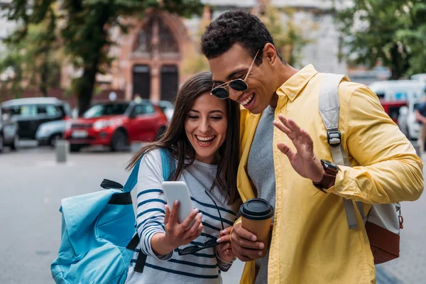 Racial Man Paper Cup Waving Hand Woman Tacking Selfie Smartphone — Stock Photo, Image