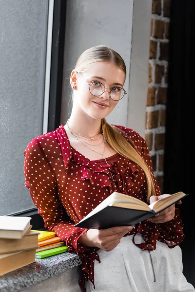 Attractive Smiling Student Glasses Holding Book Apartment — Stock Photo, Image