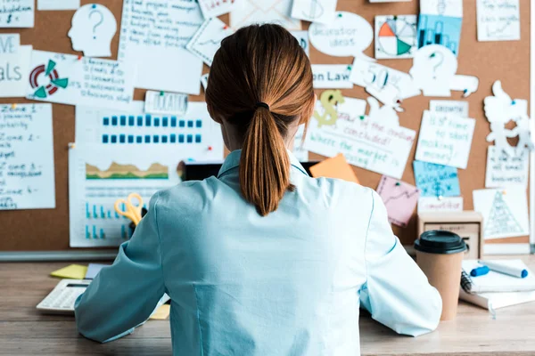 Back View Woman Sitting Desk Notice Board Letters — Stock Photo, Image