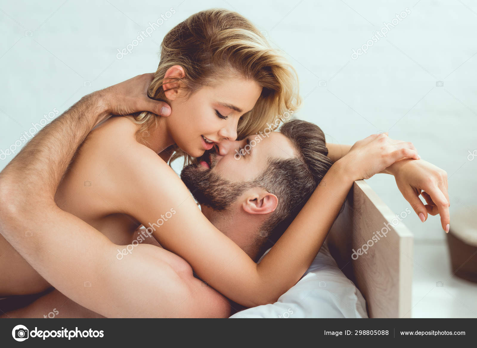 Handsome Young Man Embracing Beautiful Sexy Girlfriend While Lying Bed Stock Photo by ©HayDmitriy 298805088 pic